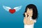 Wow. Girl looking surprised on heart with wings and shows hands