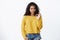 Wow really not bad, good choice. Impressed good-looking modern african-american 20s woman in yellow sweater, nod