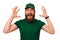 Wow says a shocked bearded man wearing green delivery uniform while screaming.