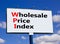 WPI wholesale price index symbol. Concept words WPI wholesale price index on big billboard on a beautiful blue sky and clouds