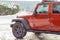 Wrangler sport jeep parking in the winter park in Canada. Close up of a red Jeep in winter day