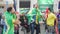 Wrap themselves with flags happy Brazil fans sing and jump