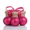 Wraped gift box with purple bow, christmas balls
