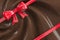 Wrapping tape with ribbon and chocolate cream