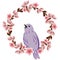 Wreath of branches of a flowering tree with lilac singing bird