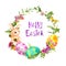 Wreath with easter bunny, colored eggs in grass, flowers, butterflies, text Happy Easter. Round frame. Watercolor