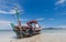 Wreck wooden fishery boat on the beach