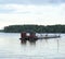 wreckage of floating chalet and fish farm