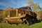 The wreckage of an old tracked all-terrain vehicle