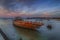 wrecked boat that sank on the beach