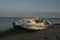 Wrecked sailboat washed ashore