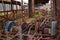 The wrecks of the buses standing on the vehicle cemetery.