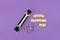 Wrench in gift box with bow and text Happy Fathers Day on purple