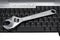 Wrench on Laptop Keyboard