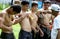 A wrestler has olive oil applied to his body prior to the start of competition at the Kirkpinar Turkish Oil Wrestling Festival, Ed