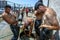 Wrestlers oil their bodies prior to competing at the Elmali Turkish Oil Wrestling Festival in Elmali in Turkey.