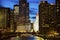 Wrigley Building surrounded by skyscrapers