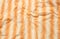 The wrinkled of clothes pattern orange color for background