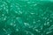 Wrinkled green plastic sheet for background or text