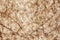 Wrinkled porous brown paper close-up. Background, texture