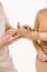 Wrist external orthosis to reduce pathological mobility of wrist joints. Traumatologist puts external wrist bandage on