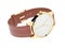 Wrist watch. White dial with golden case and brown leather bracelet. 3d rendering illustration