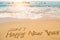 Write happy new year 2017 on beach