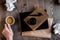 Writer workplace with tools on wooden background top view