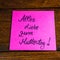 Writing All love for mother`s day in german  Alles Liebe zum Muttertag on memo post reminder. Text on sticky paper. Mother`s day