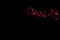 Writing `Covid-19` with red laser pointer on a empty wall, close up, abstract photography