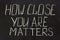 Writing on a dark board How clouse you are matters