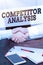 Writing displaying text Competitor Analysis. Business concept assessment of the strengths and weaknesses of rival firm