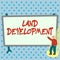 Writing displaying text Land Development. Word for process of acquiring land for constructing infrastructures Colorful