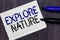 Writing Explore Nture text made in the office closeup on laptop computer keyboard. Business concept for Reserve Campsite Conservat