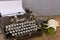 Writing and freelance concept. Vintage typewriter with flowers b