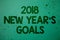 Writing note showing 2018 New Years Goals. Business photo showcasing resolution List of things you want to achieve Ideas messages