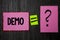 Writing note showing Demo. Business photo showcasing Trial Beta Version Free Test Sample Preview of something Prototype Pink note