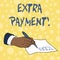 Writing note showing Extra Payment. Business photo showcasing pay extra money in addition to your required loan payment.