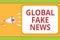 Writing note showing Global Fake News. Business photo showcasing False information Journalism Lies Disinformation Hoax Message ide