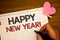 Writing note showing Happy New Year Motivational Call. Business photo showcasing Greeting Celebrating Holiday Fresh Start Man hol