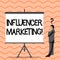 Writing note showing Influencer Marketing. Business photo showcasing focus is placed influential showing rather than