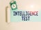 Writing note showing Intelligence Test. Business photo showcasing test designed to measure the ability to think and reason Alarm