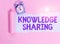Writing note showing Knowledge Sharing. Business photo showcasing deliberate exchange of information that helps with agility Alarm