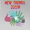 Writing note showing New Trends 2019. Business photo showcasing general direction in which something is developing Hand