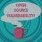 Writing note showing Open Source Vulnerability. Business photo showcasing Publicized Exploits are open to malicious users Mug of