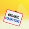 Writing note showing Organic Marketing. Business photo showcasing getting your customers to come to you naturally over time Stamp