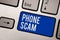 Writing note showing Phone Scam. Business photo showcasing getting unwanted calls to promote products or service Telesales Keyboar