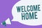 Writing note showing Welcome Home. Business photo showcasing Expression Greetings New Owners Domicile Doormat Entry Megaphone loud