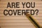 Writing note showing Are You Covered Question. Business photo showcasing Have a Security and Health Insurance Medical Care Ideas