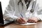 Writing a prescription or medical examination